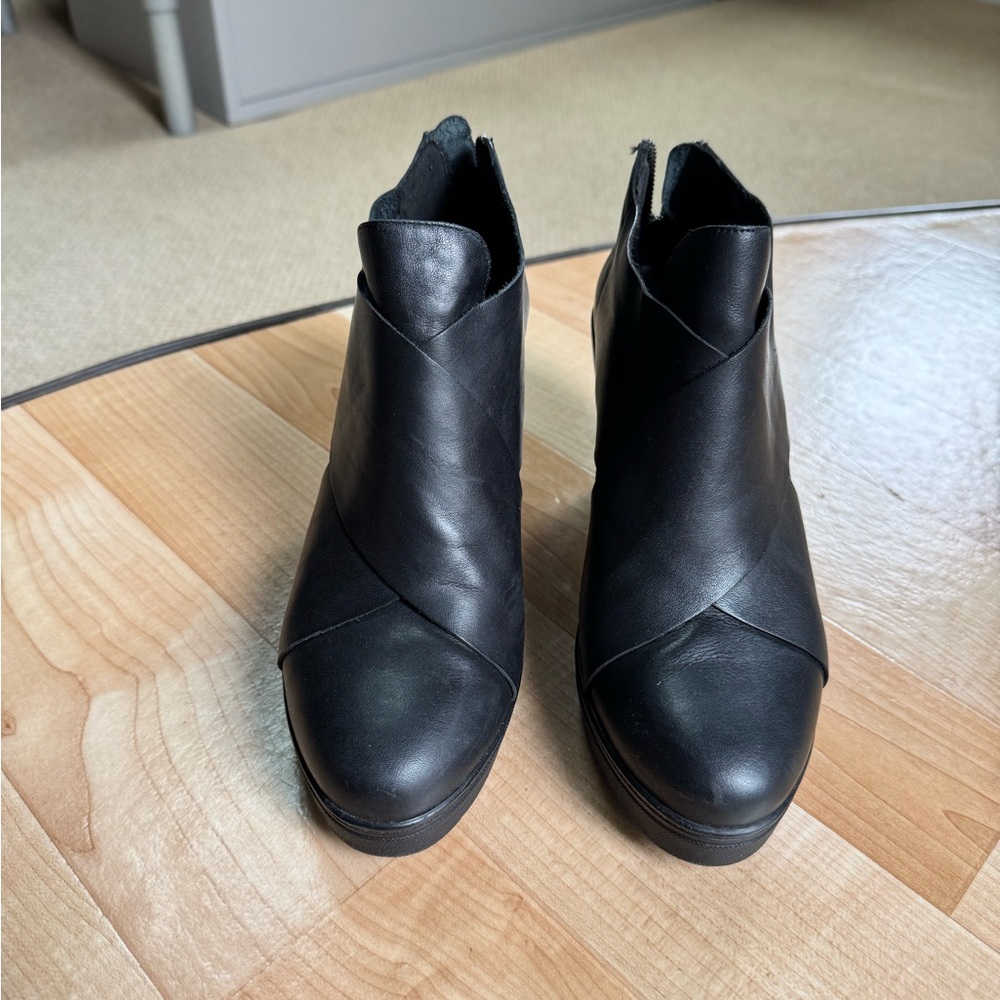 Eileen Fisher black leather, rubber soled shoe boots. Never worn